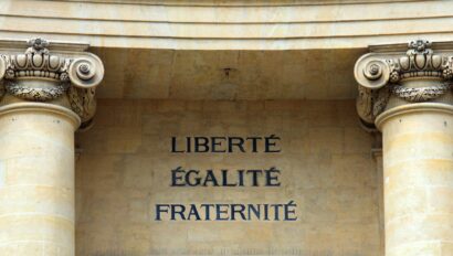 The words Liberté, Égalité, and Fraternité written on a building in France